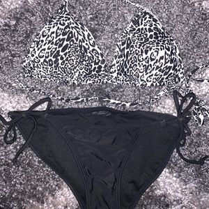 Zebra pattern bikini top with black bottoms